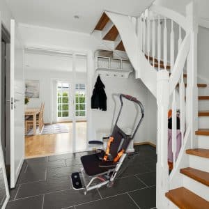 Portable stair lift in hallway — best stair lifts for elderly