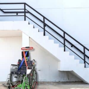 Stair climber for wheelchair users positioned at outdoor staircase, demonstrating safe access solution.